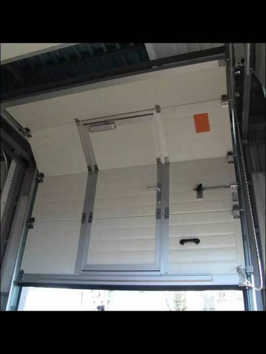 What are the main cost components of industrial sliding doors?