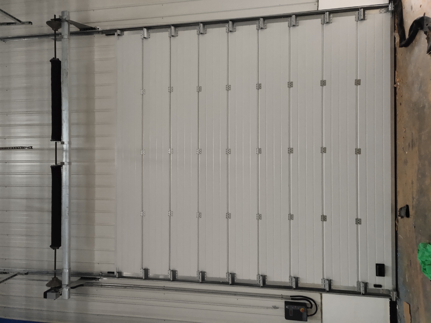 How to ensure the long-term safety of industrial sliding doors?