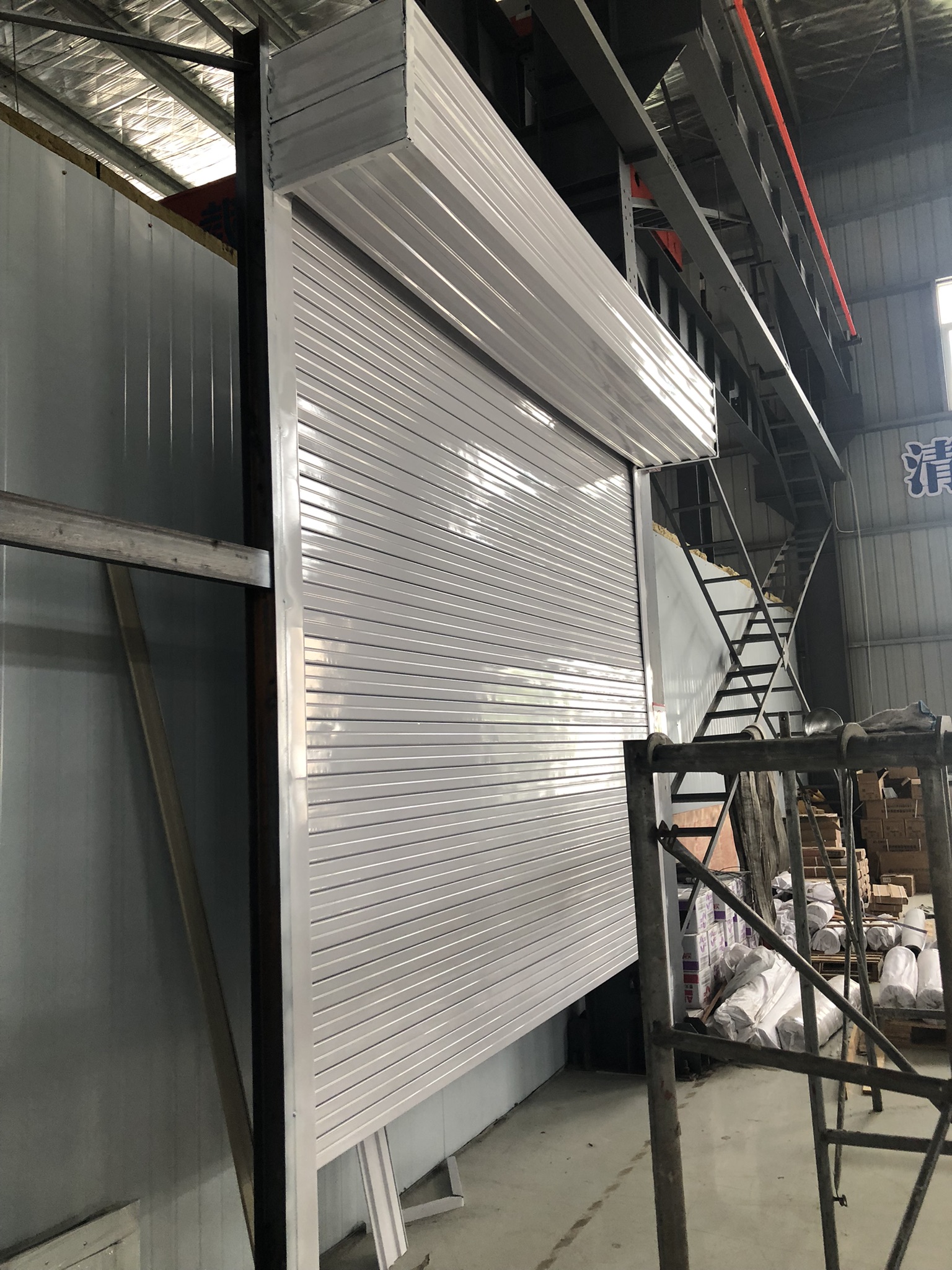 What are the main factors affecting the growth of the aluminum rolling door market?