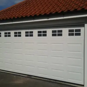 Overhead Motorized Bifold Sectional Garage Door